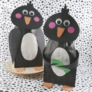 Easy Penguin Craft for kids made with a paper lunch bag