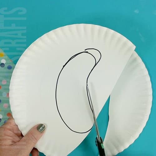A simple and fun pickle craft for kids, featuring an easy food-themed project perfect for holiday crafting or anytime creativity. step 2 draw and cut out the pickle shape