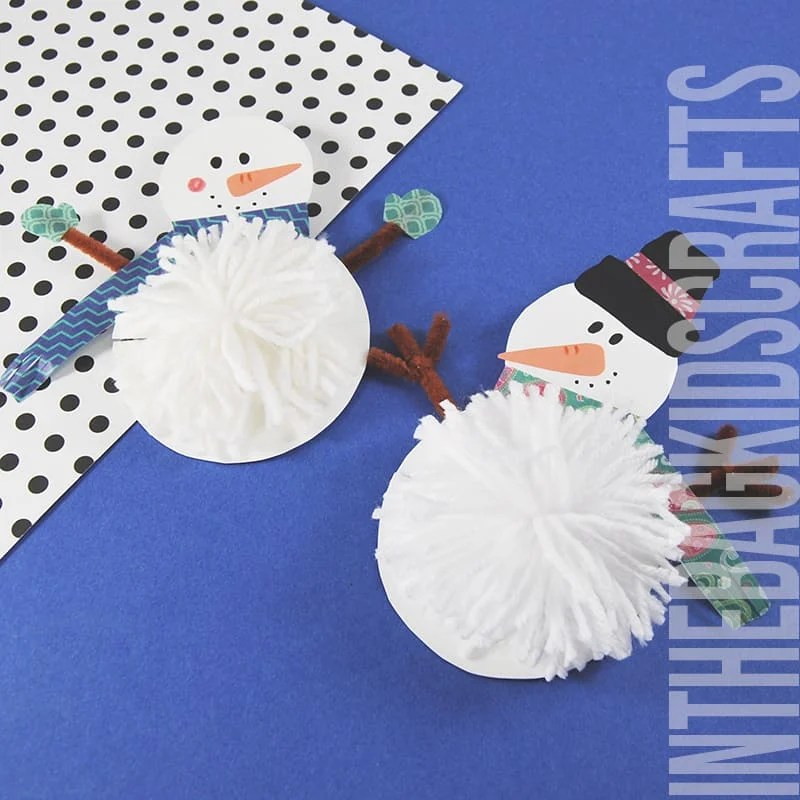 snowman craft for kids with white DIY pompom in center