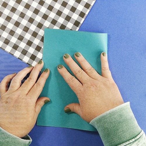 Rainbow craft step 1 folding the paper in half 