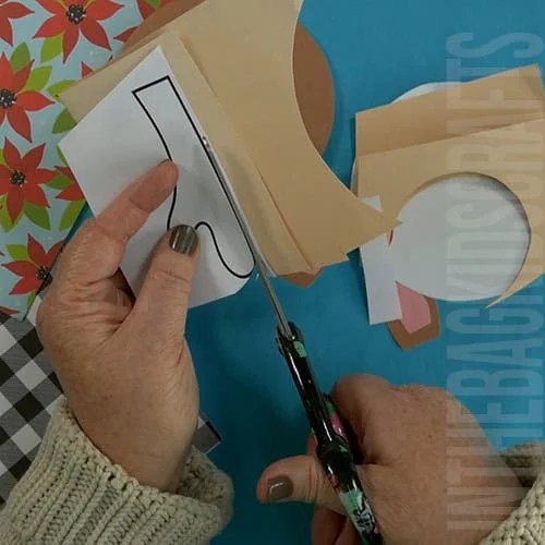 A DIY reindeer card featuring a fun and festive design, perfect as a Christmas card or Christmas craft for kids to create their own personalized holiday greetings.
