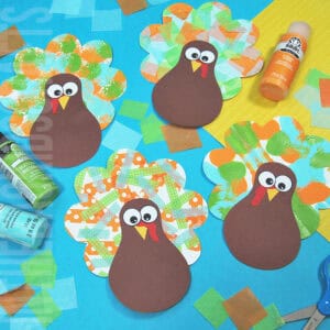 Colorful turkey craft for kids featuring a free turkey outline, ideal as a Thanksgiving craft for preschool and kindergarten children.