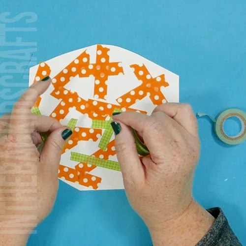 Colorful turkey craft for kids featuring a free turkey outline, ideal as a Thanksgiving craft for preschool and kindergarten children.  washi tape turkey feathers 