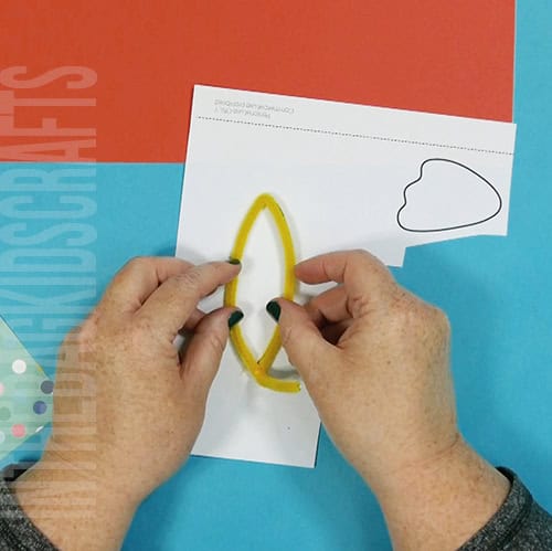 A colorful and simple turkey craft for kids featuring a cut-and-paste design, ideal for preschool craft and fall-themed Thanksgiving activities. step 4 creating the turkey feather stamp