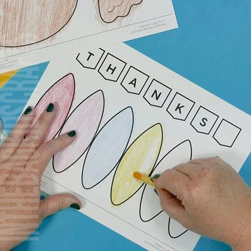 A colorful, kid-friendly turkey craft for Thanksgiving featuring a free printable template, perfect for a gratitude-themed craft for kids. Step 1 coloring