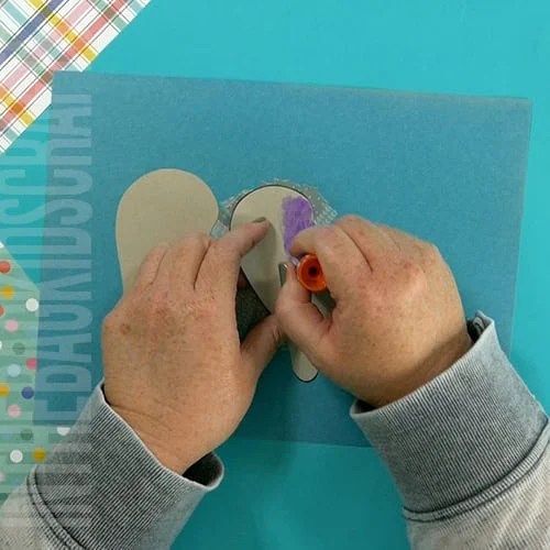An image showing an easy elephant craft for kids, perfect as an animal craft and fine motor activity.  step 4