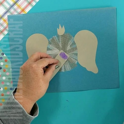 An image showing an easy elephant craft for kids, perfect as an animal craft and fine motor activity. step 4