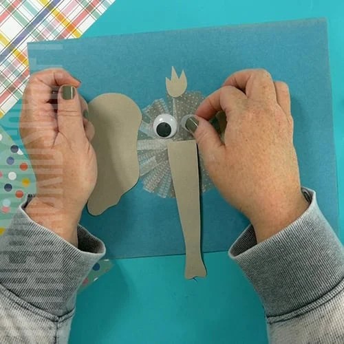 An image showing an easy elephant craft for kids, perfect as an animal craft and fine motor activity. step 5