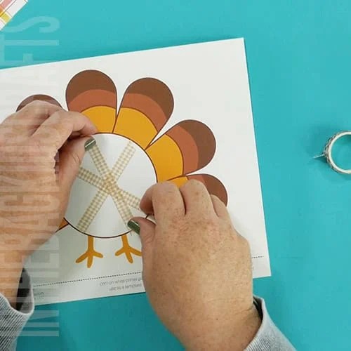 An image showing a preschool Thanksgiving turkey craft, designed as a fun and easy fine motor activity for kids step 2