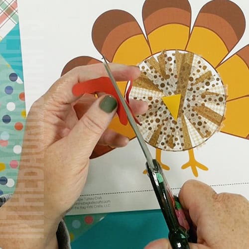 An image showing a preschool Thanksgiving turkey craft, designed as a fun and easy fine motor activity for kids. step 3