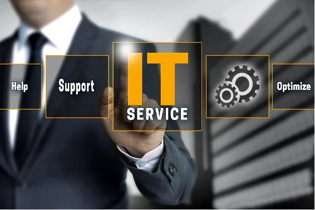 Business professional pointing at IT service icons for ServiceNow consulting and support.