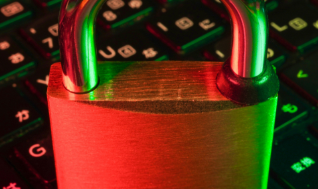 Secure lock symbol on a keyboard representing cybersecurity and data protection.