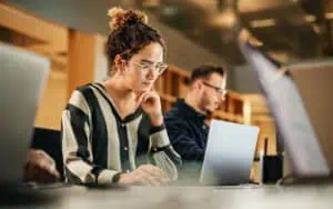 Diverse team participating in user training for technology adoption.