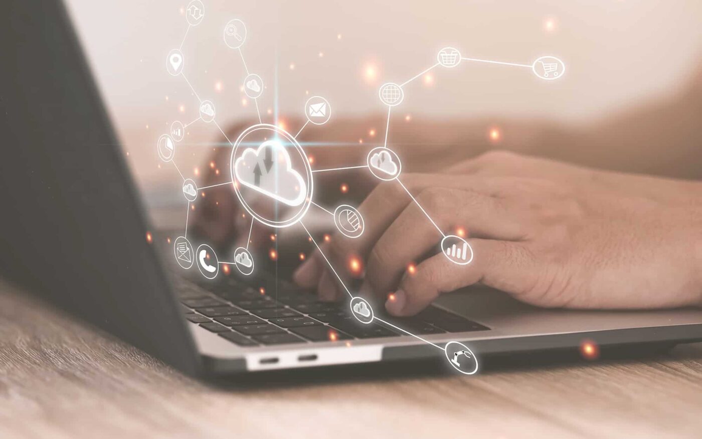 Modern cloud computing and data management technology on a laptop.