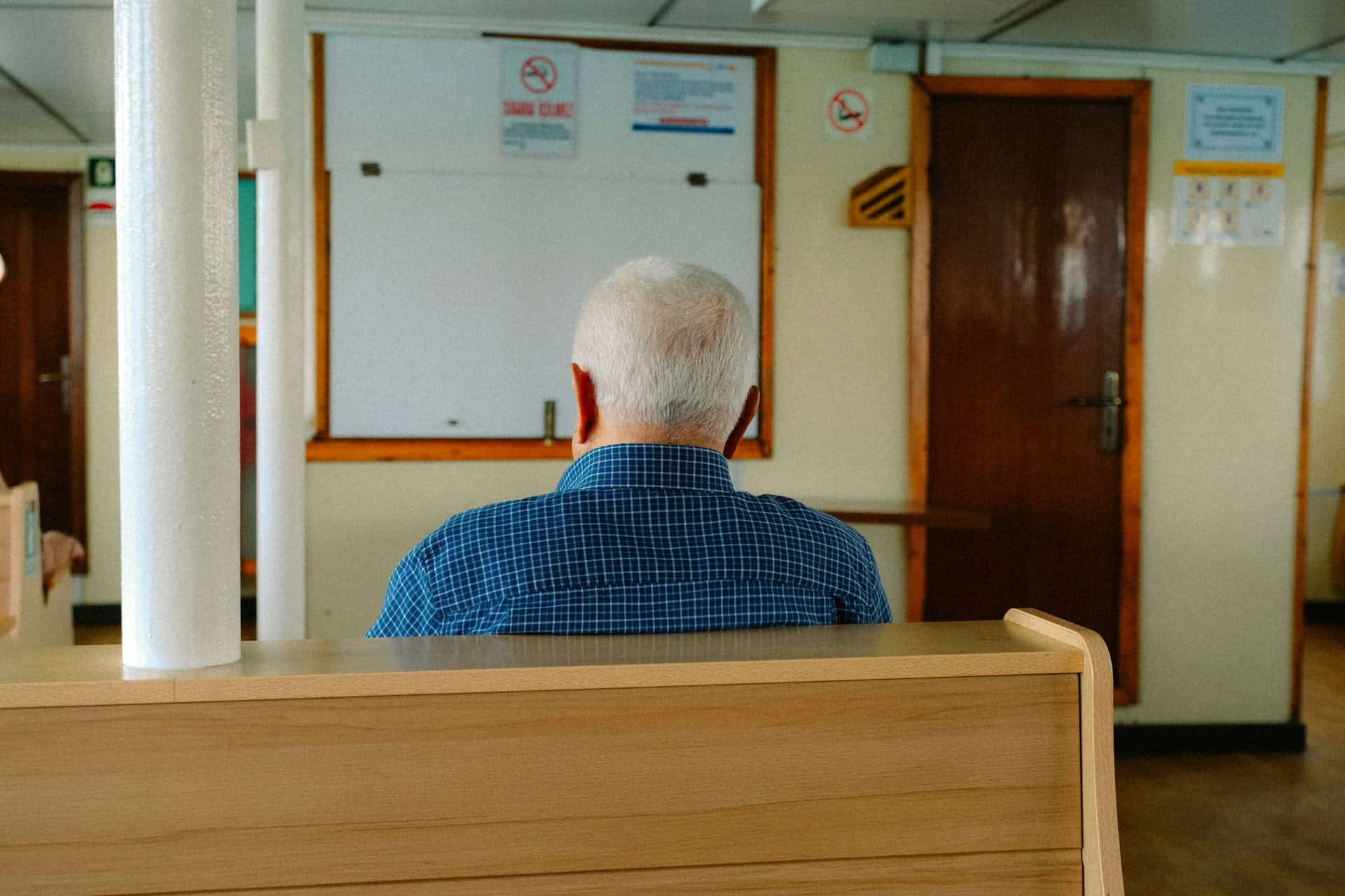 Nrusing home abuse vs neglect elderly man sits alone
