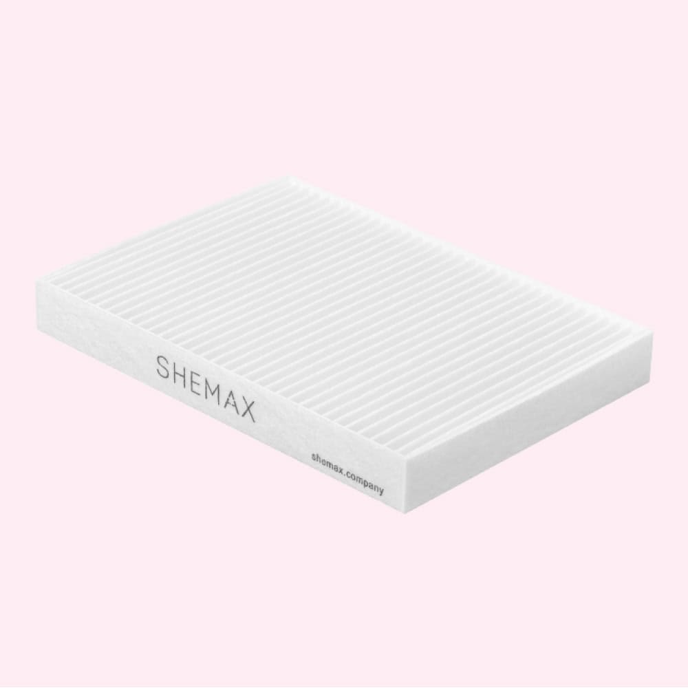 Schuurspons voor nagelverzorging en manicure, wit met "SHEMAX" branding op roze achtergrond.