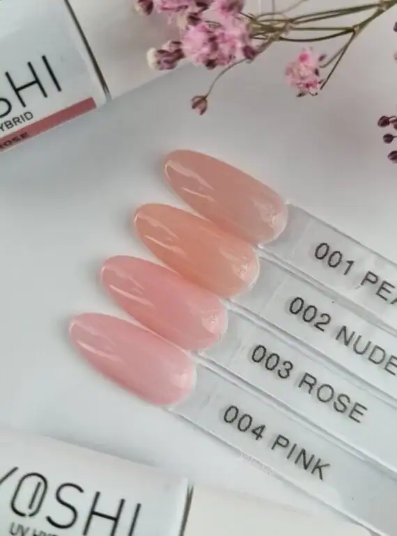 Nagelstalen met pastelkleuren in roze en nude, perfect voor manicure en nagelontwerp.