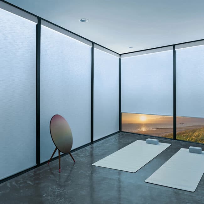 Aura® Illuminated Roller Shades in Sawgrass set to Cool Light