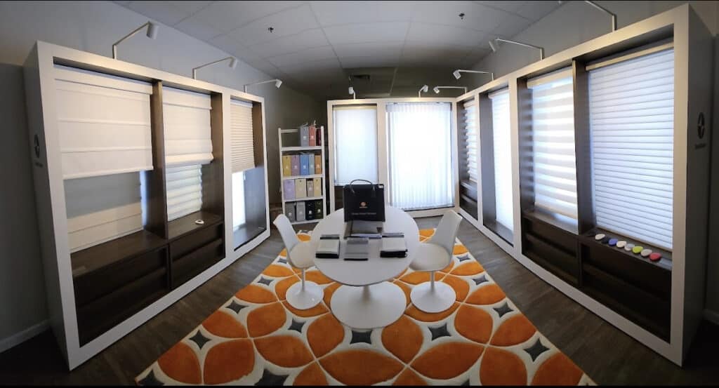 Custom window shades display showroom for stylish and functional window treatments in Florida. Explore roller and zebra shades, perfect for residential and commercial spaces.