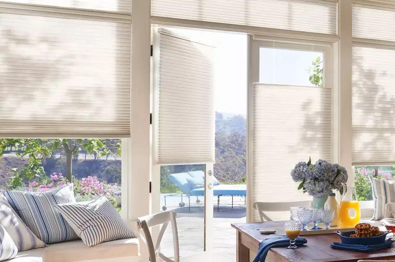 Kitchen patio door with cellular shades installed