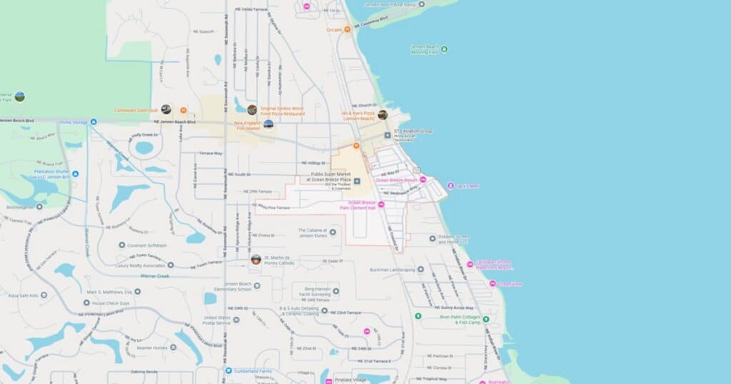 Map of a coastal city showing streets, parks, and points of interest along the shoreline.
