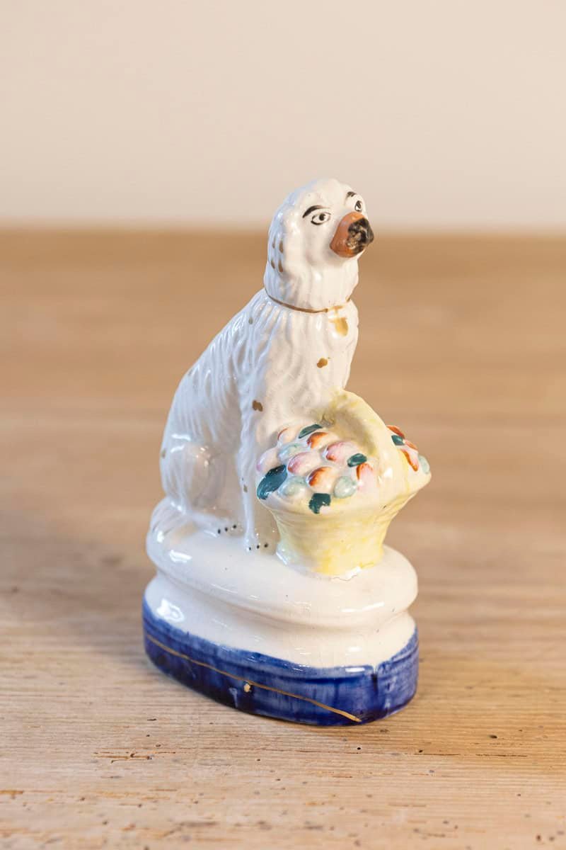 Petite English Michael Davis Porcelain Dog with Fruit Basket and Blue Oval Base - JAA