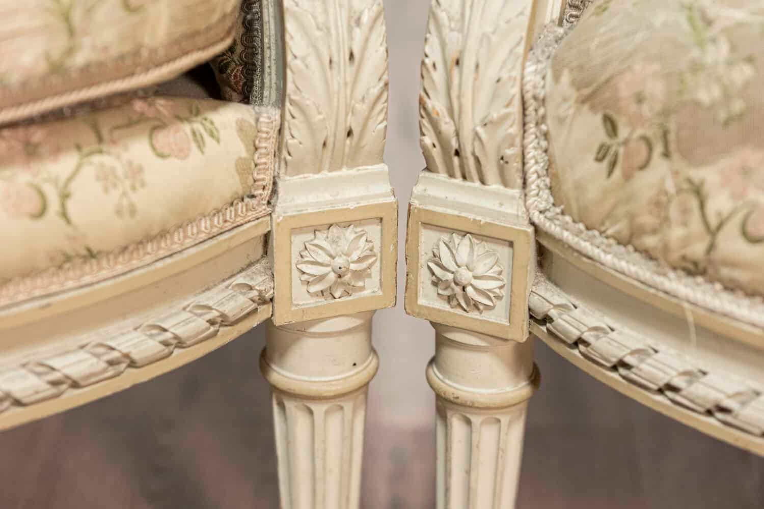 Pair of French Louis XVI Style 1900s Painted and Carved Bergères à Oreilles - JAA