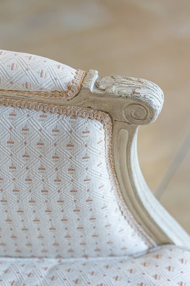 Pair of French Louis XVI Style Painted Bergères Chairs with Oval Shaped Backs - JAA