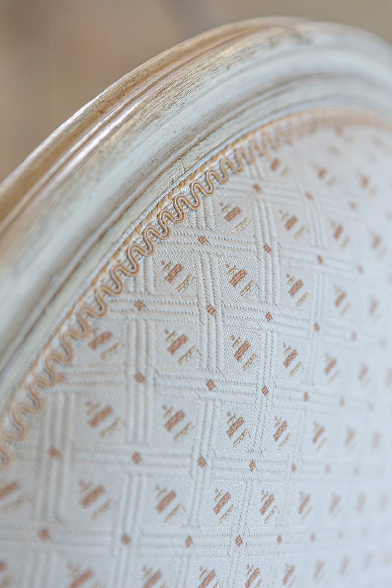 Pair of French Louis XVI Style Painted Bergères Chairs with Oval Shaped Backs - JAA