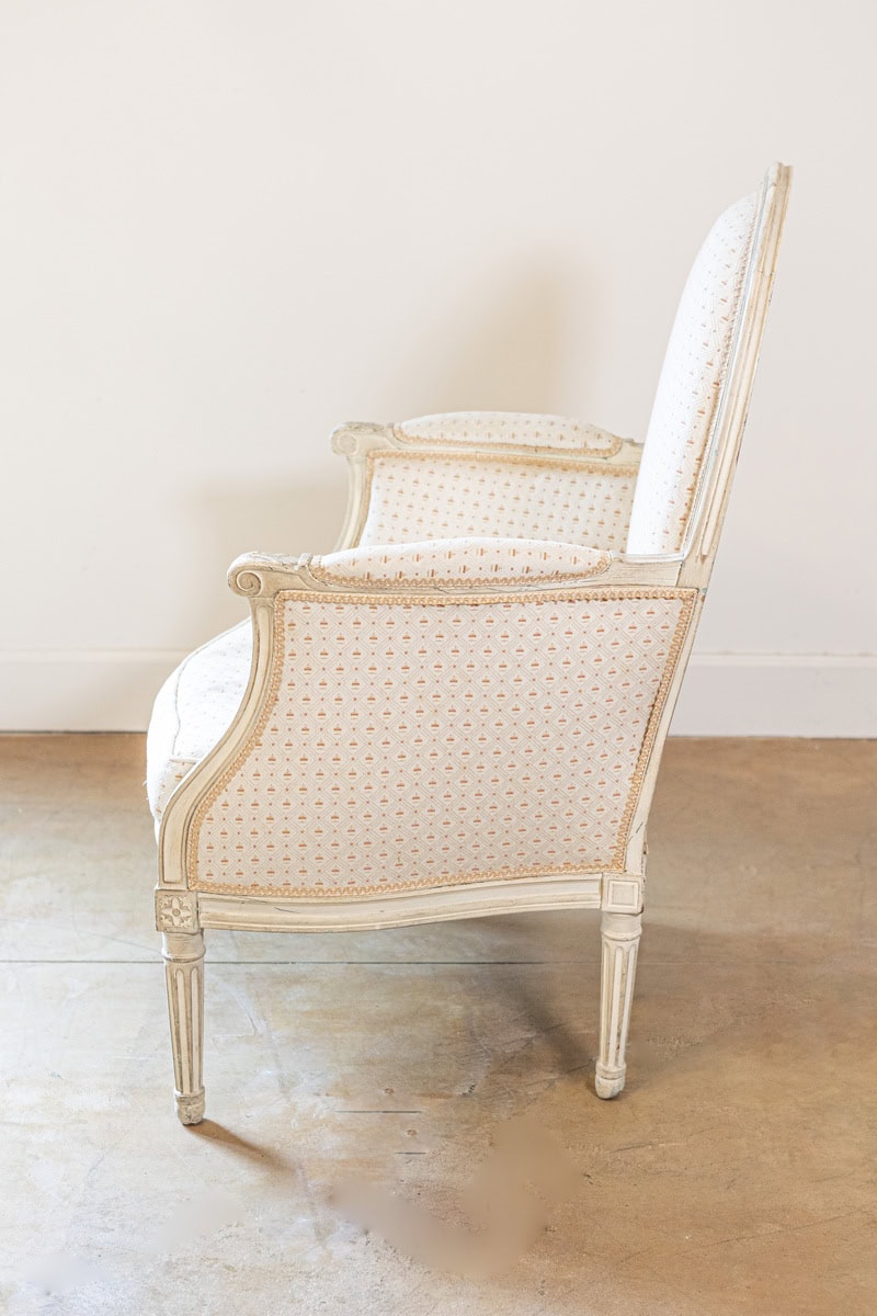 Pair of French Louis XVI Style Painted Bergères Chairs with Oval Shaped Backs - JAA