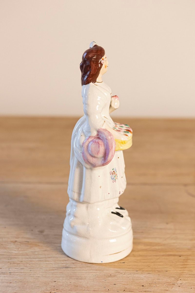 Petite English Porcelain Decorative Object Depicting a Lady with a Floral Basket - JAA