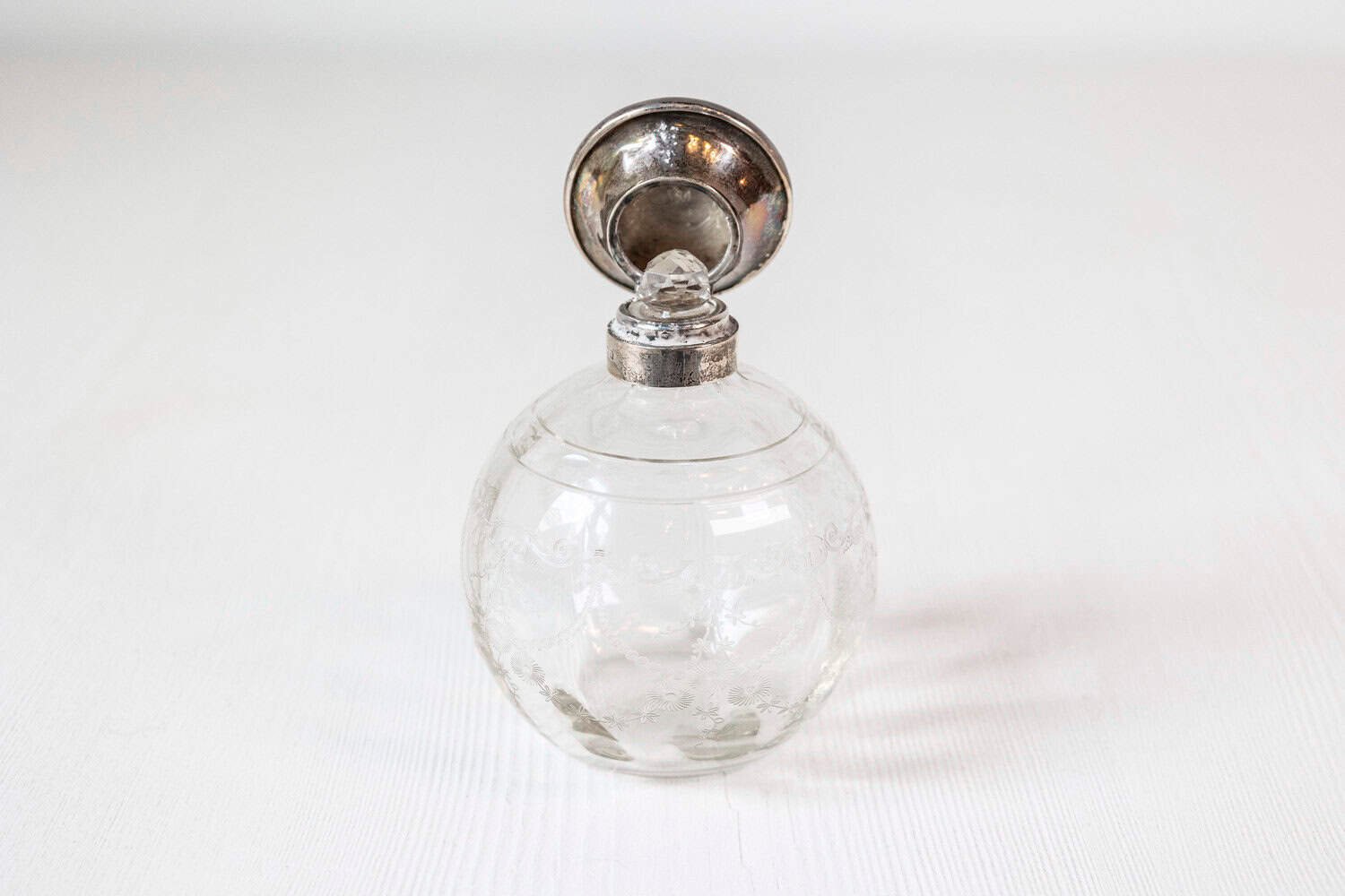 Small English 20th Century Glass Vanity Bottle with Silver Lid and Etched Design - JAA