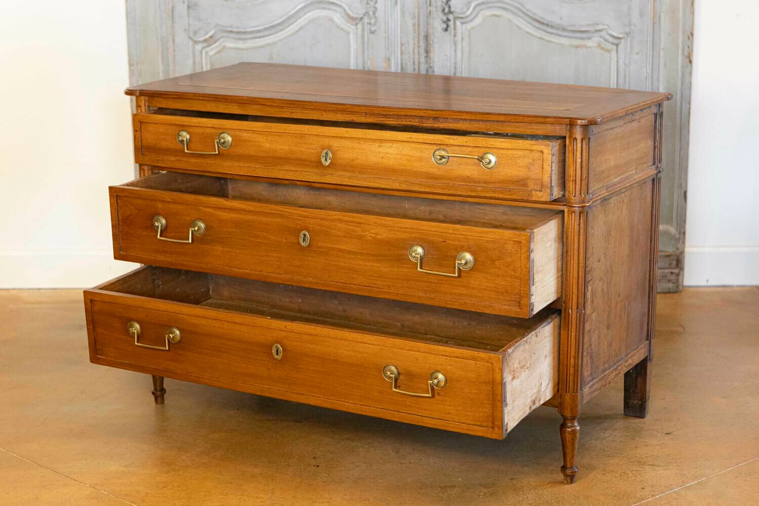 French 1890s Louis XVI Style Three-Drawer Commode with Rounded Fluted Side Posts - JAA