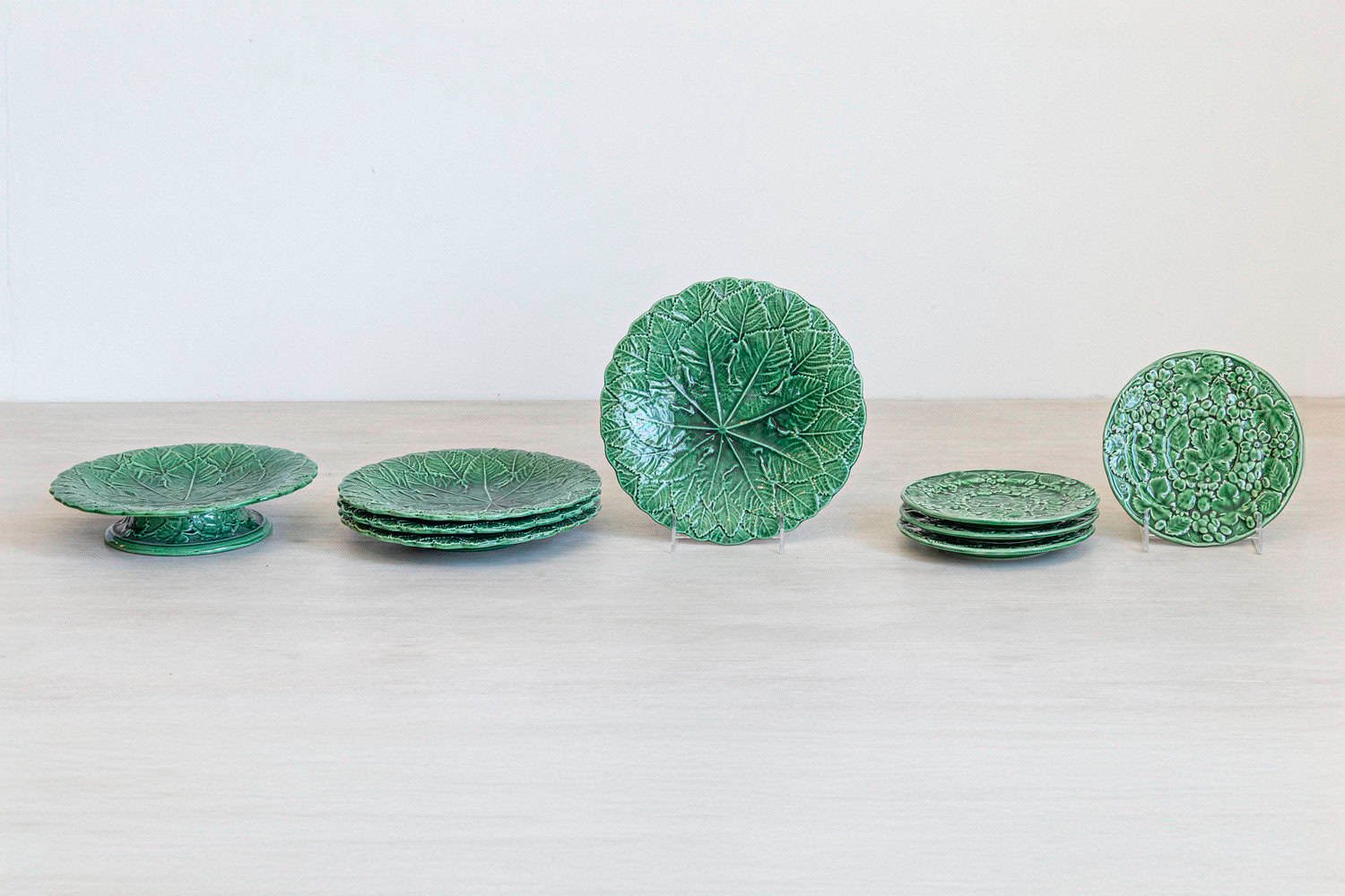 Set of Nine Green Glazed Porcelain Pieces with Eight Plates and Single Compote - JAA