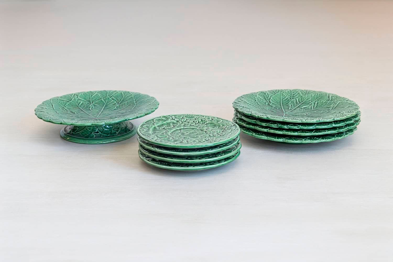 Set of Nine Green Glazed Porcelain Pieces with Eight Plates and Single Compote - JAA