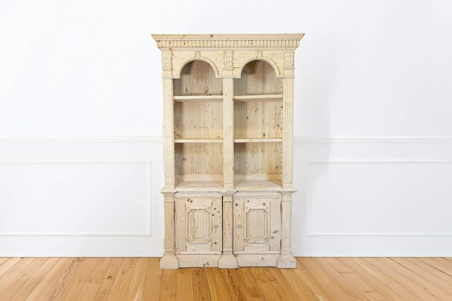 Italian Neoclassical Style Carved Pine Bookcase with Arched Motifs and Capitals - JAA