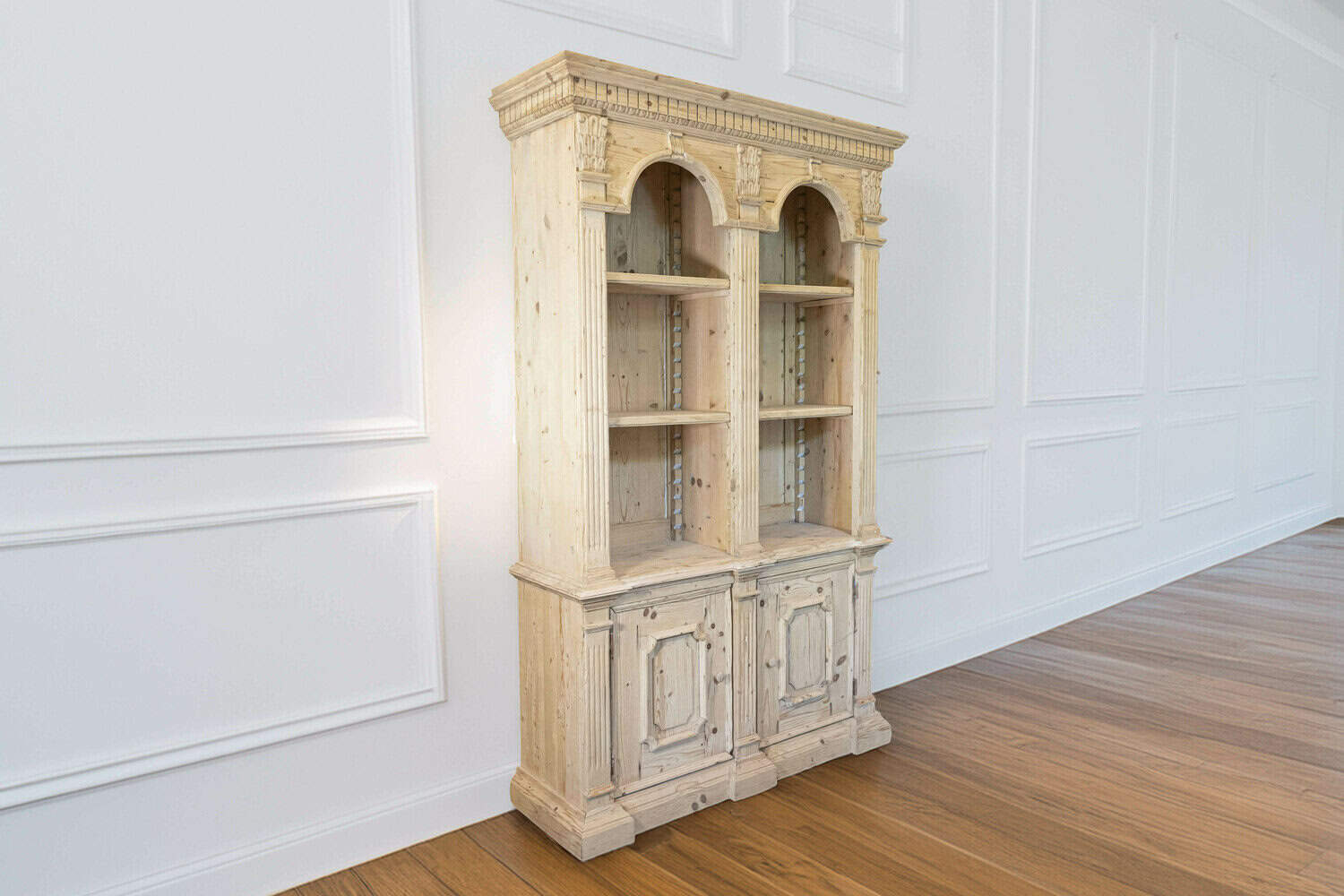 Italian Neoclassical Style Carved Pine Bookcase with Arched Motifs and Capitals - JAA