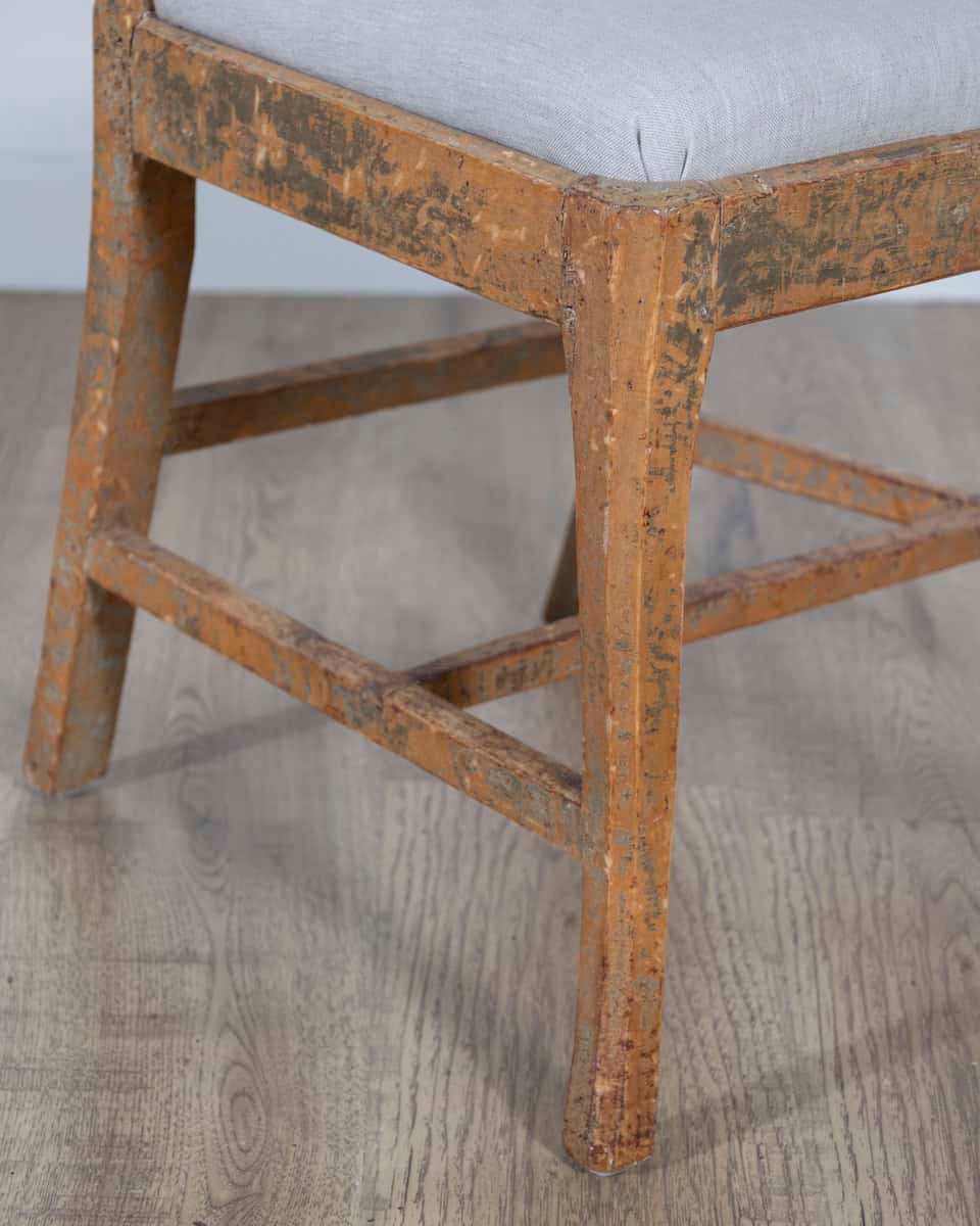 A pair of slender Gustavian chairs with smiling details, scraped to original paint and newly covered in linen. Circa 1780 - JAA