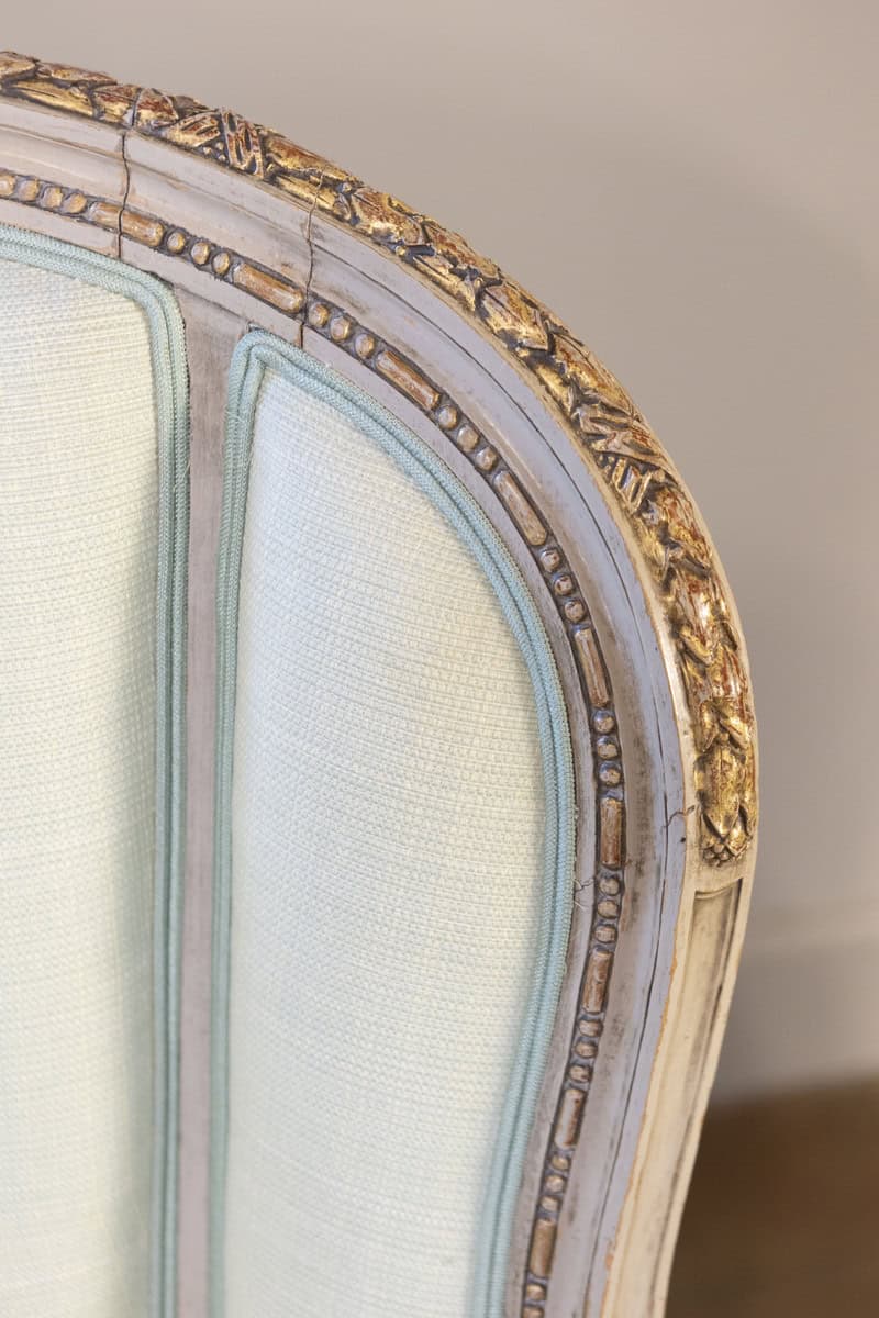 Pair of French Louis XVI Style 1900s Painted and Parcel-Gilt Bergères Chairs - JAA