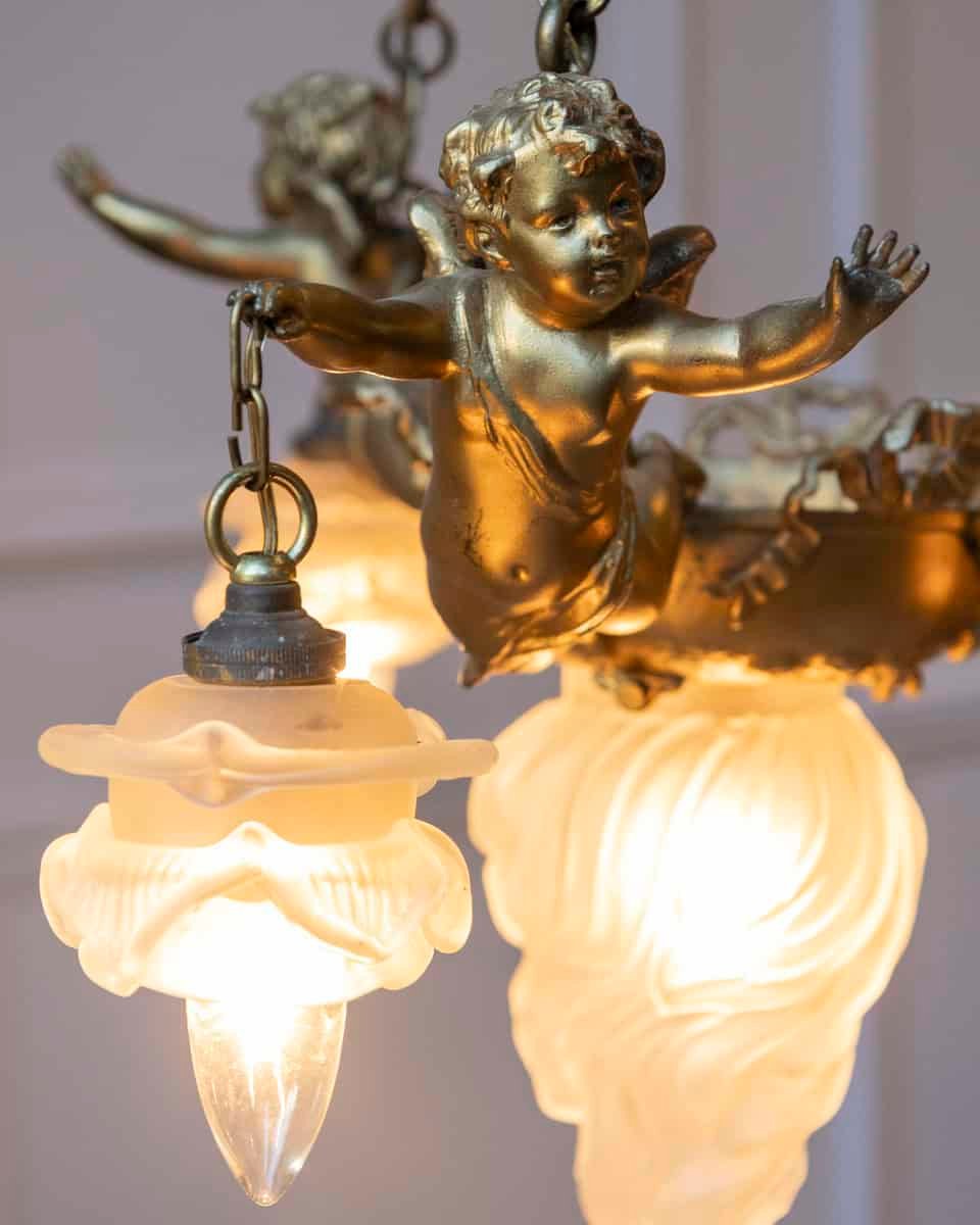 40% OFF. French 19th Century Gilt Metal Chandelier with Three Cherubs Holding the Lights - JAA