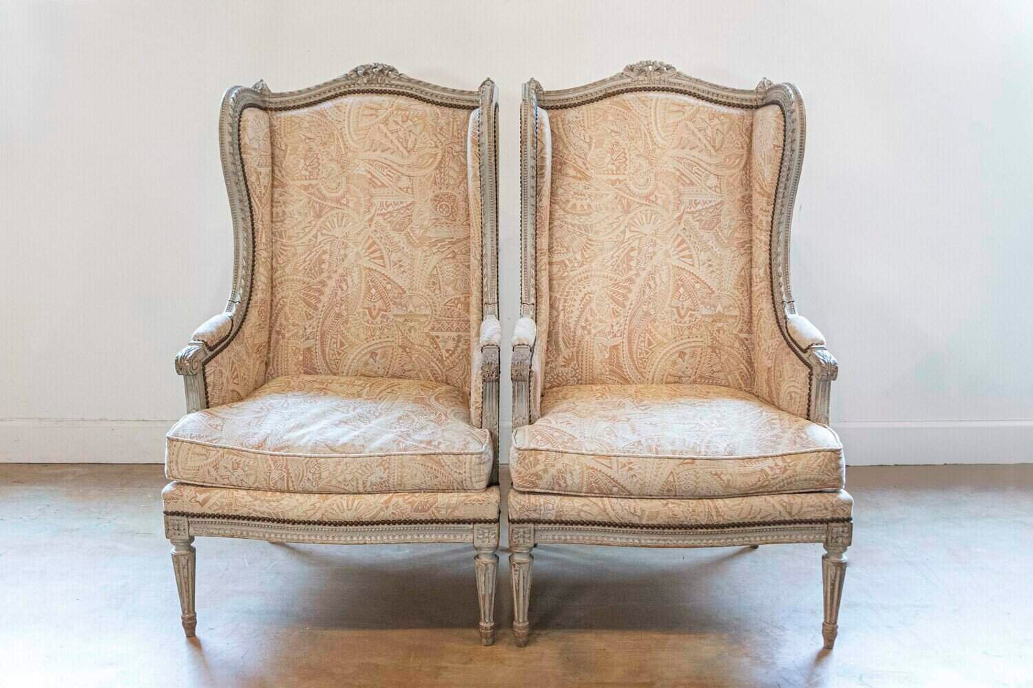 Pair of French Louis XVI Style Painted and Carved Wooden Bergères à Oreilles - JAA