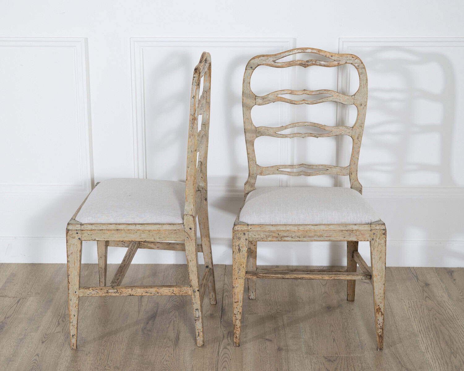 ON TRIAL - A set of four period Gustavian chairs scraped to original paint and newly covered in linen - JAA