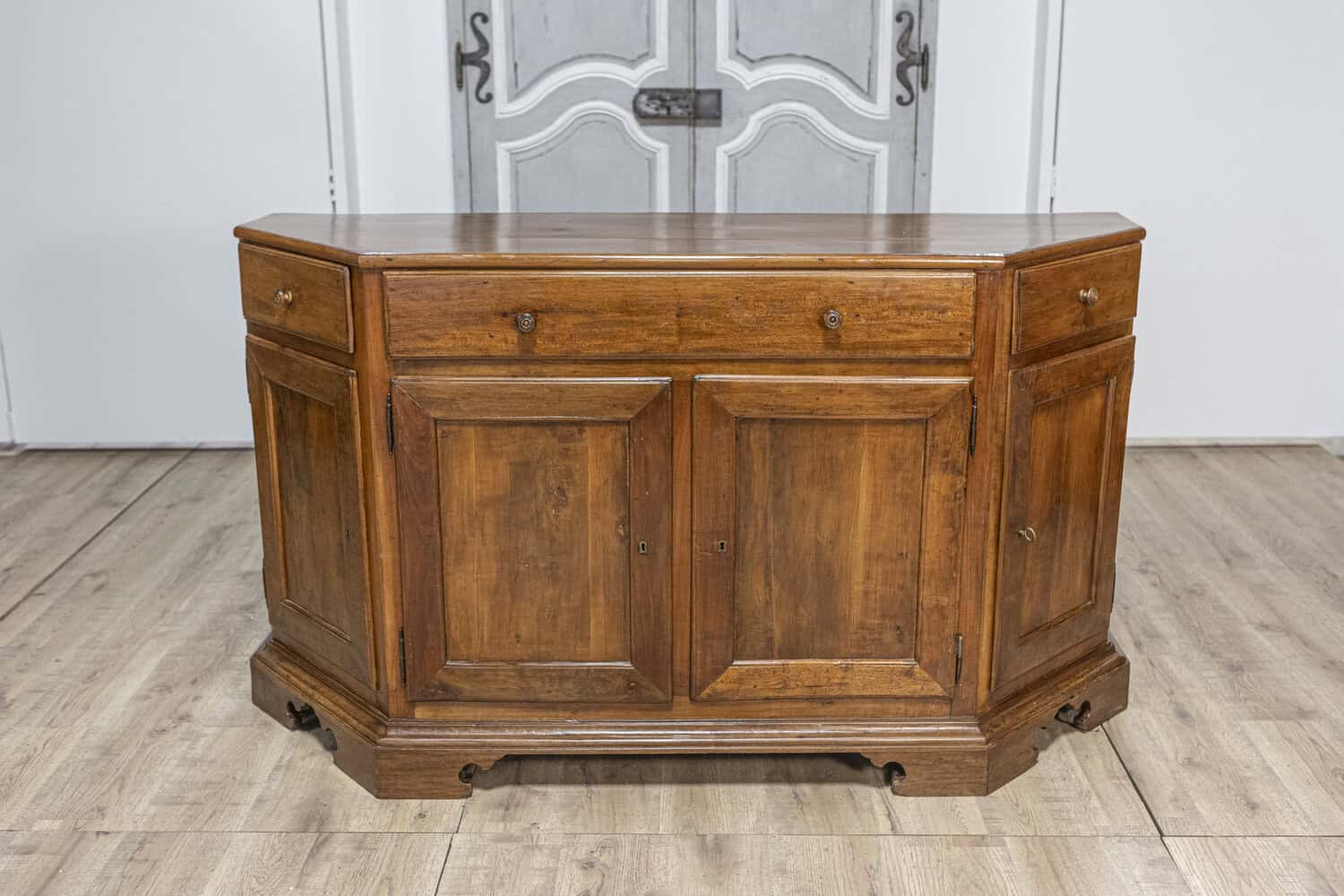 Italian 19th Century Walnut Credenza with Drawers over Doors and Canted Sides - JAA