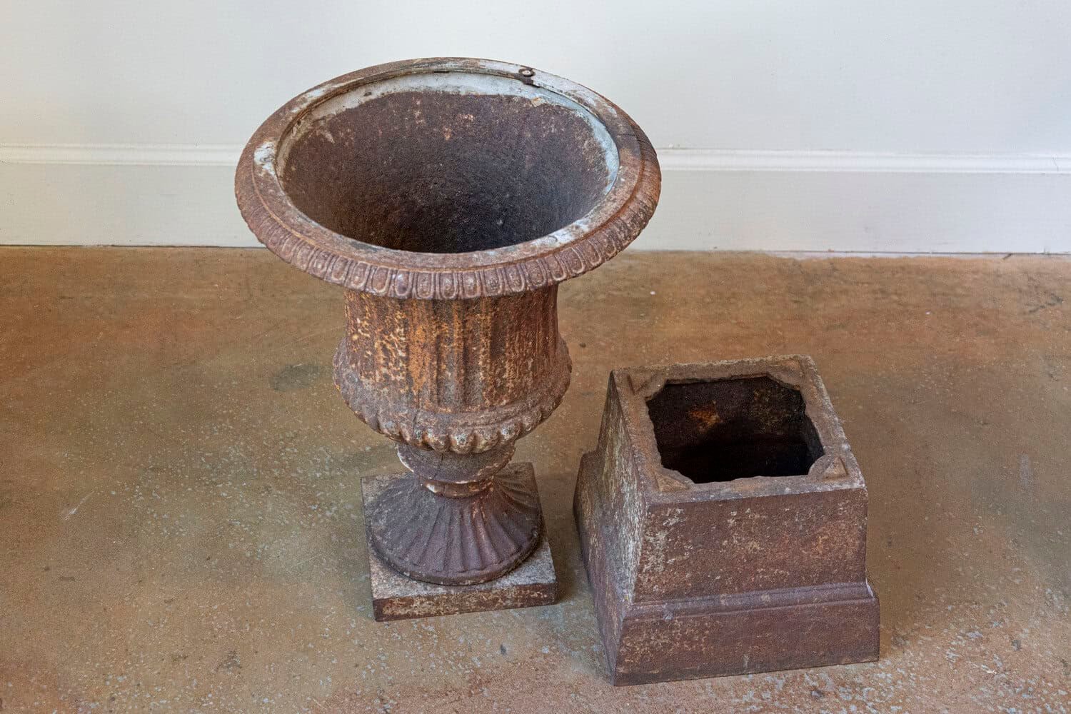 Pair of French 19th Century Iron Médicis Vases on Stepped Pedestals with Patina - JAA