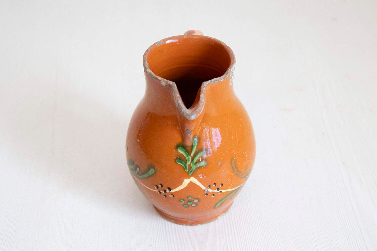 French 19th Century Redware Floral Pitcher with Orange, Cream and Green Glaze - JAA