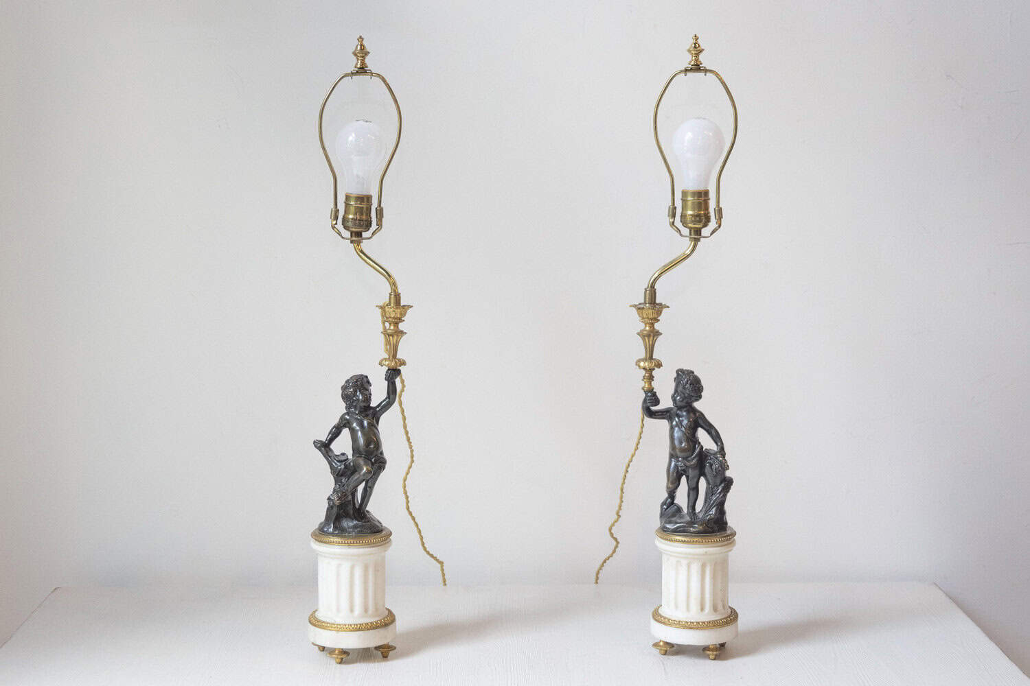 40% OFF at Checkout. Pair of French 19th Century Neoclassical Style Marble and Bronze Putti Lamps - JAA