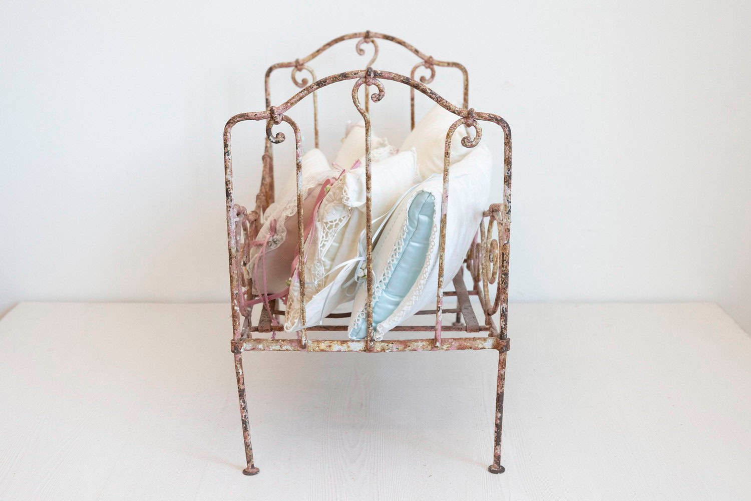 Assortment of Vintage Lace Pillows in 19th Century Metal Crib with Great Patina - JAA