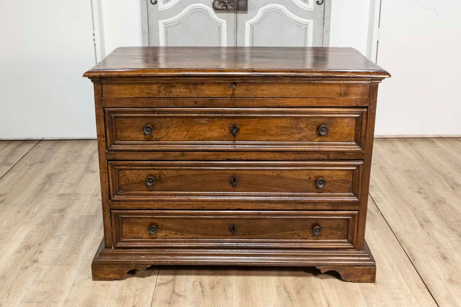 Italian 17th Century Walnut Four-Drawer Commode with Carved Bracket Feet - JAA