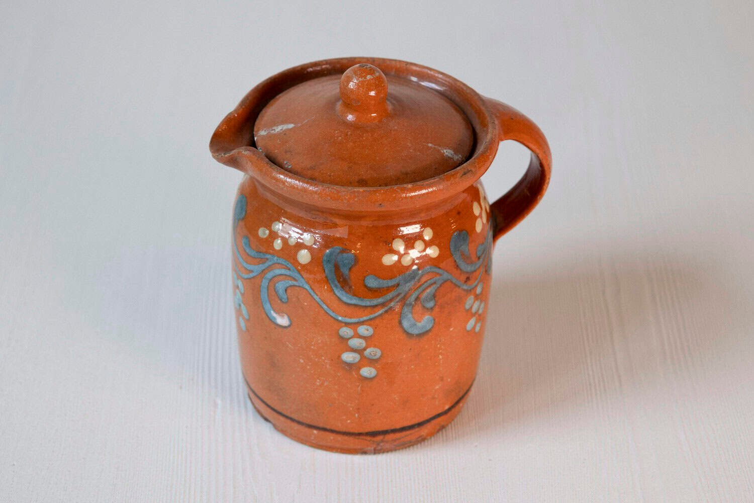 French 19th Century Pottery Pitcher with Orange and Blue Glaze and Foliage Motif - JAA
