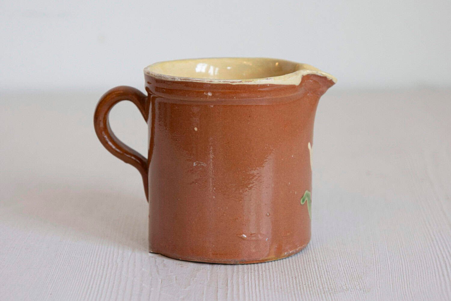 French 19th Century Redware Pitcher with White Flower Decor - JAA
